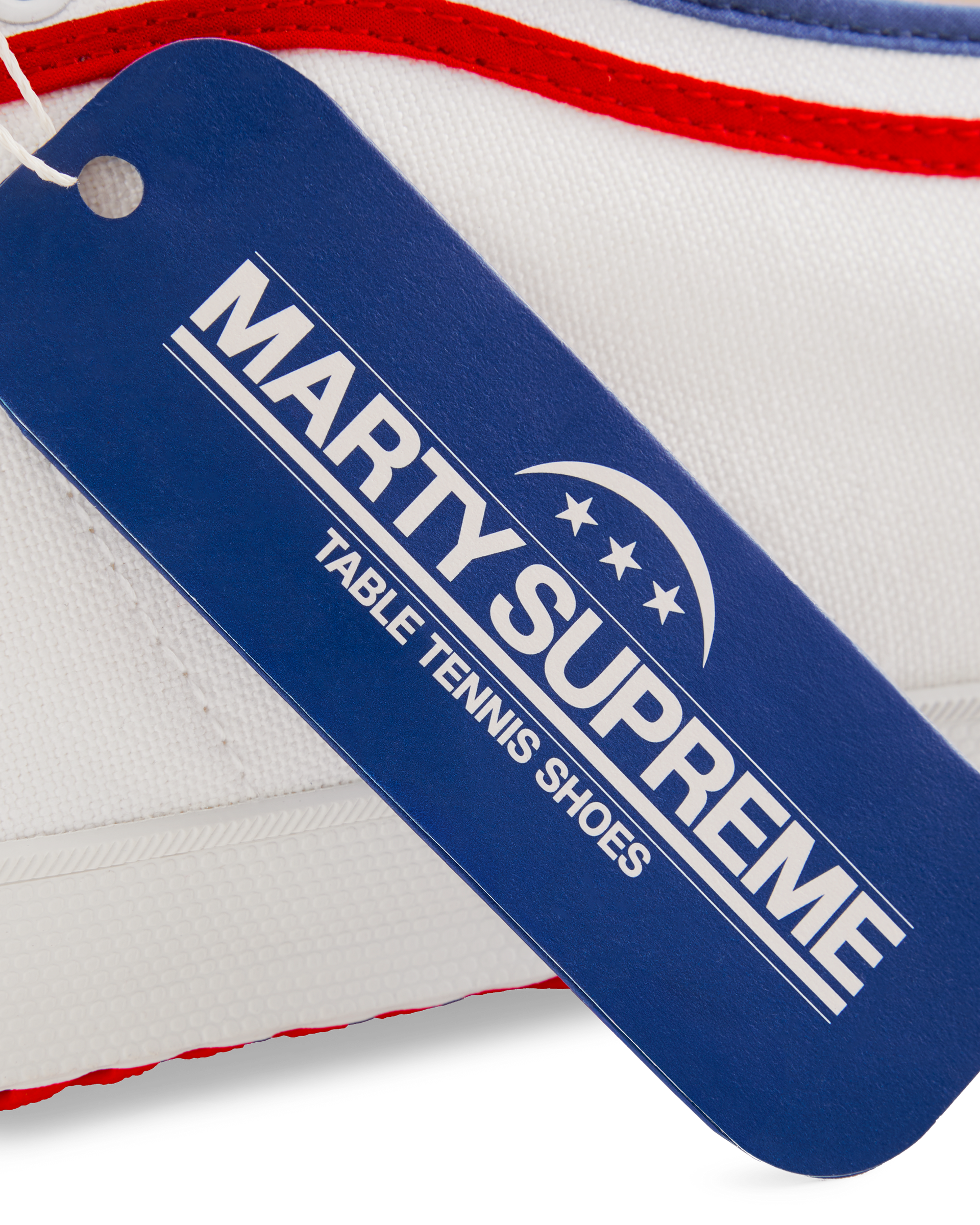Blue collaboration hangtag from the Koyo Bear x Marty Supreme release, highlighting the limited-edition Made in Japan craftsmanship and heritage performance design.