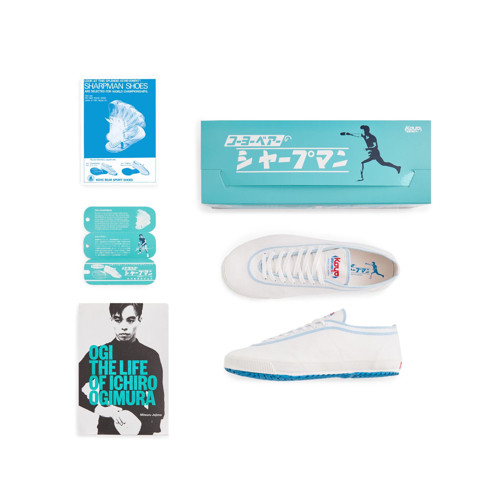 Set view of the handmade Koyo Bear Sharpman Blue Trim canvas sneakers, made in Japan, including the shoe box, hangtags, postcard, and the book “The Life of Ichiro Ogimura,” celebrating the world’s first purpose-built table tennis shoe.