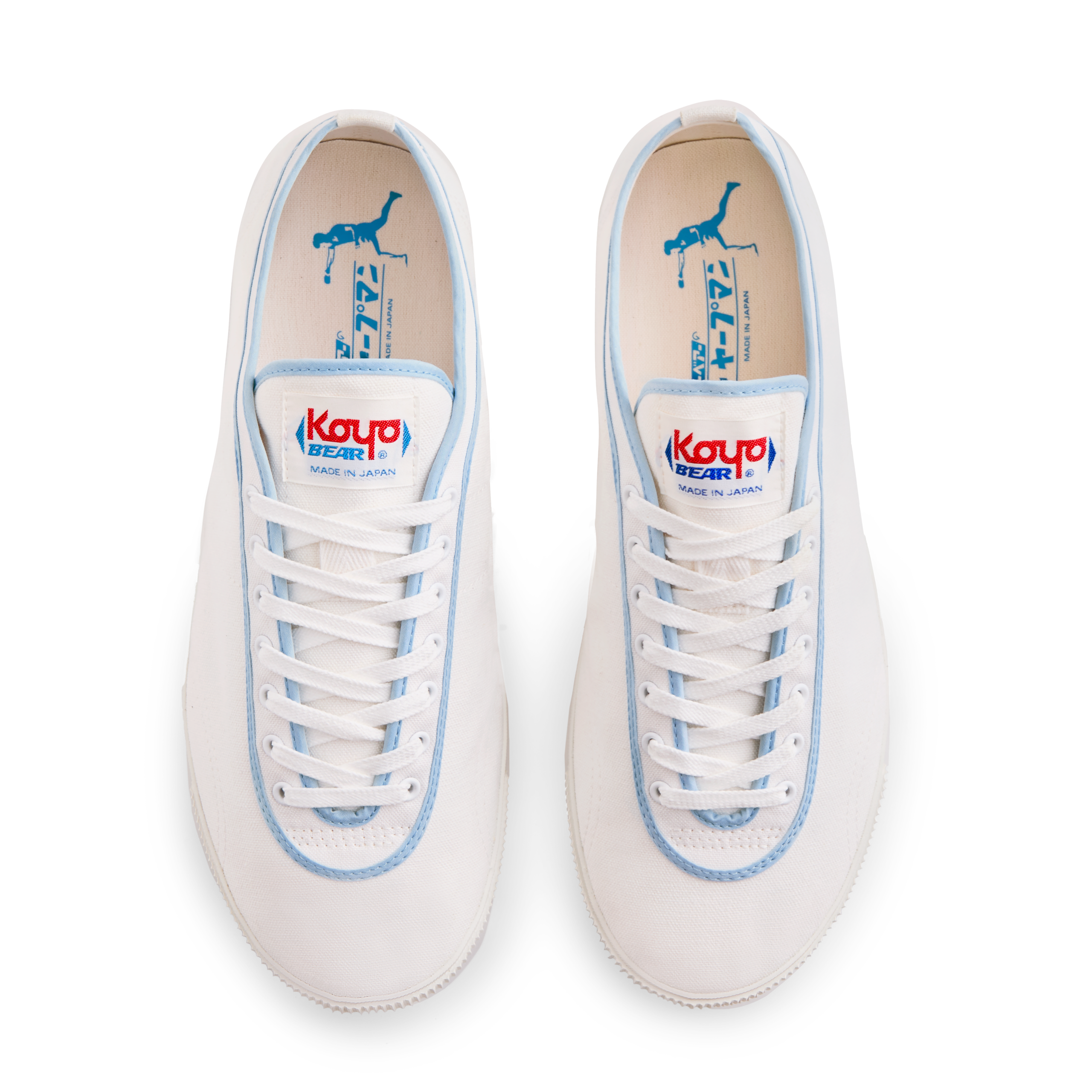 Top view of the handmade Koyo Bear Sharpman Blue Trim canvas sneakers, made in Japan in white canvas with light blue piping, shown as a matching pair of the world’s first purpose-built table tennis shoe with the insole branding visible.