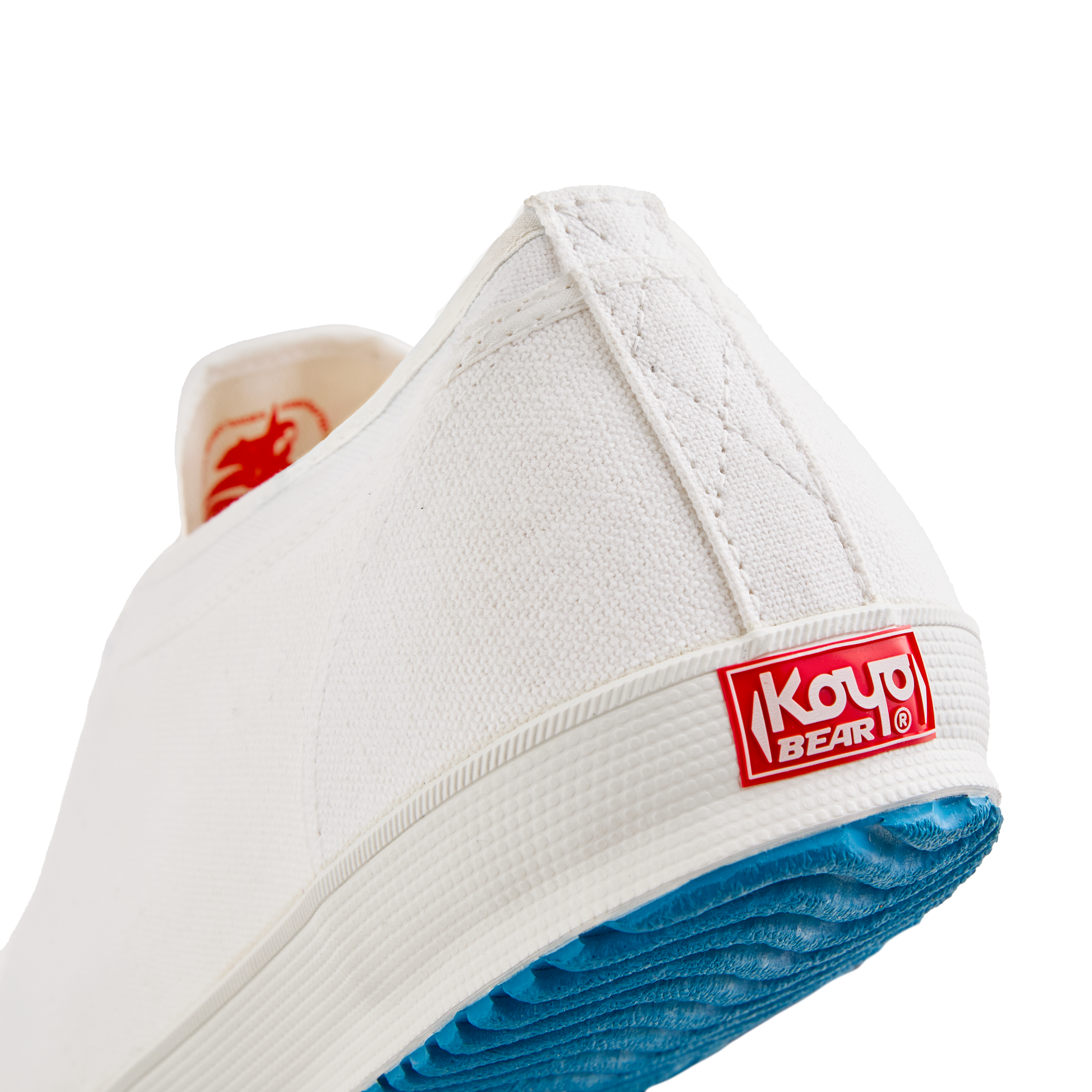 Back view of the handmade Koyo Bear Sharpman White Trim canvas sneakers, made in Japan, showing the heel logo and vulcanised rubber sole of the world’s first table tennis shoe.