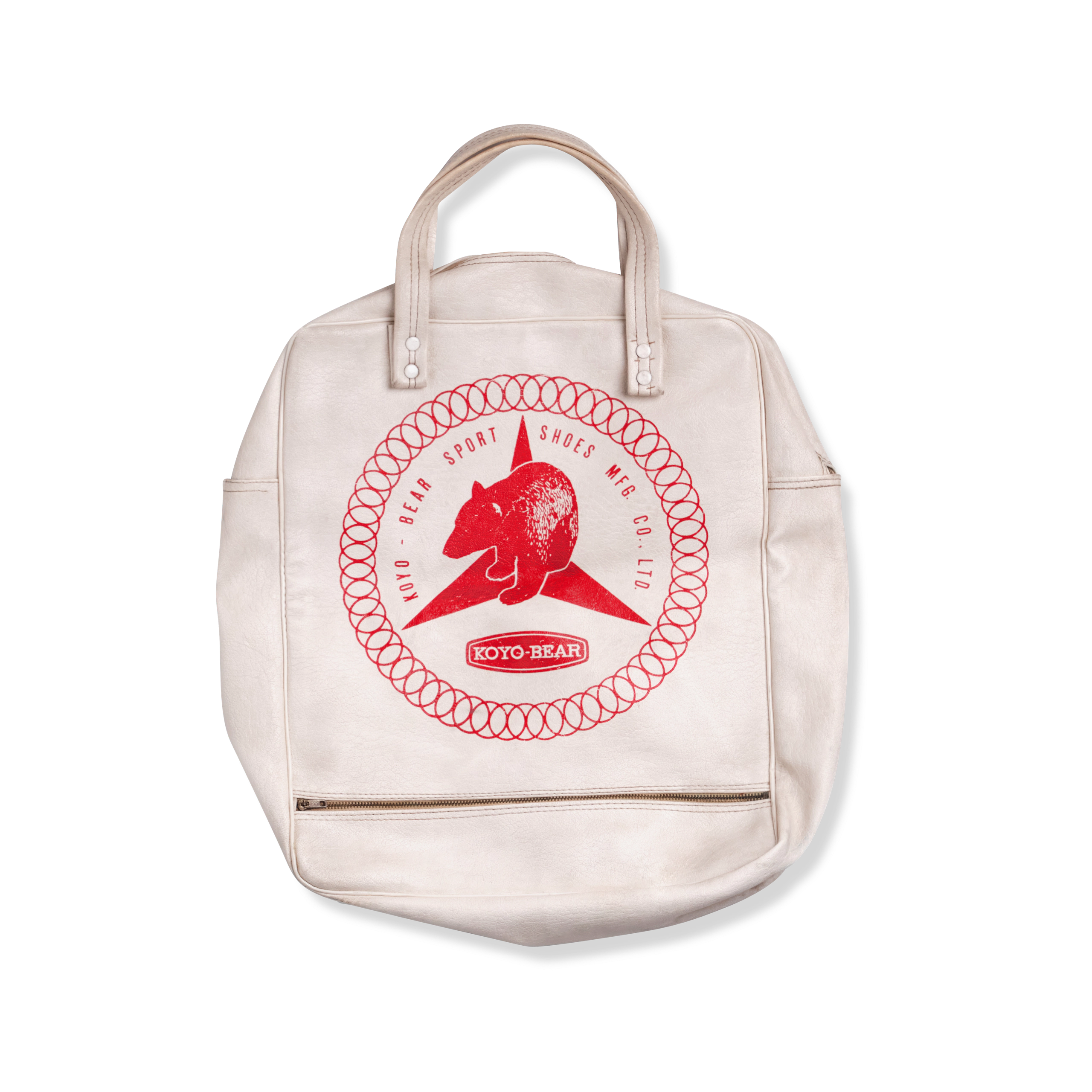 Koyo Bear beige backpack with red Koyo Bear Logo on a white background