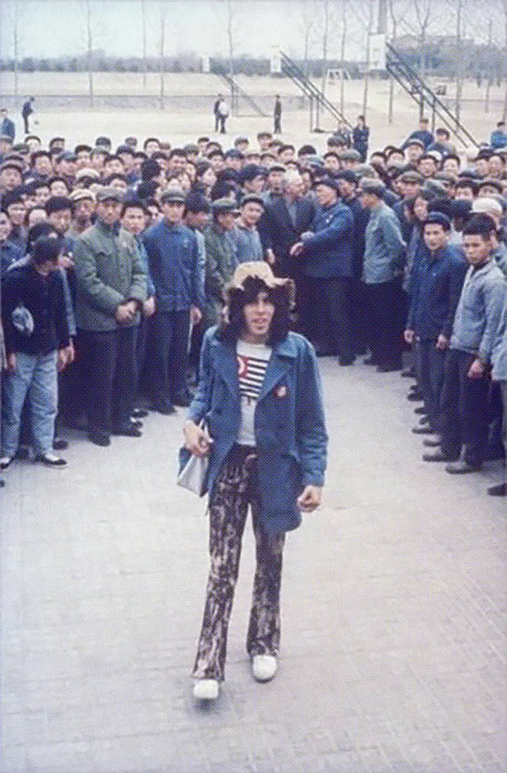 Glenn Cowan of the U.S. table tennis team walking through a crowd in China during the 1971 Ping Pong Diplomacy, wearing Koyo Bear Sharpman shoes in the moment that helped open relations between the United States and China.