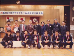 Ichiro Ogimura with the Seitakukai table tennis team after winning the All Japan Club Championship in Nagano in 1982.