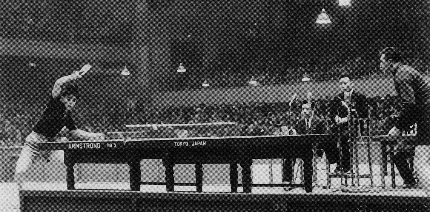 Ichiro Ogimura competing in a table tennis match in Tokyo, captured during his era as a world champion and pioneer of modern competitive table tennis.