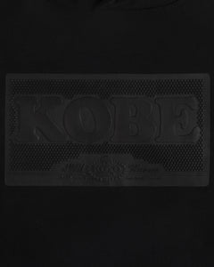 Rubberised KOBE logo patch by Koyo Bear with short pips texture, shown in black on black.