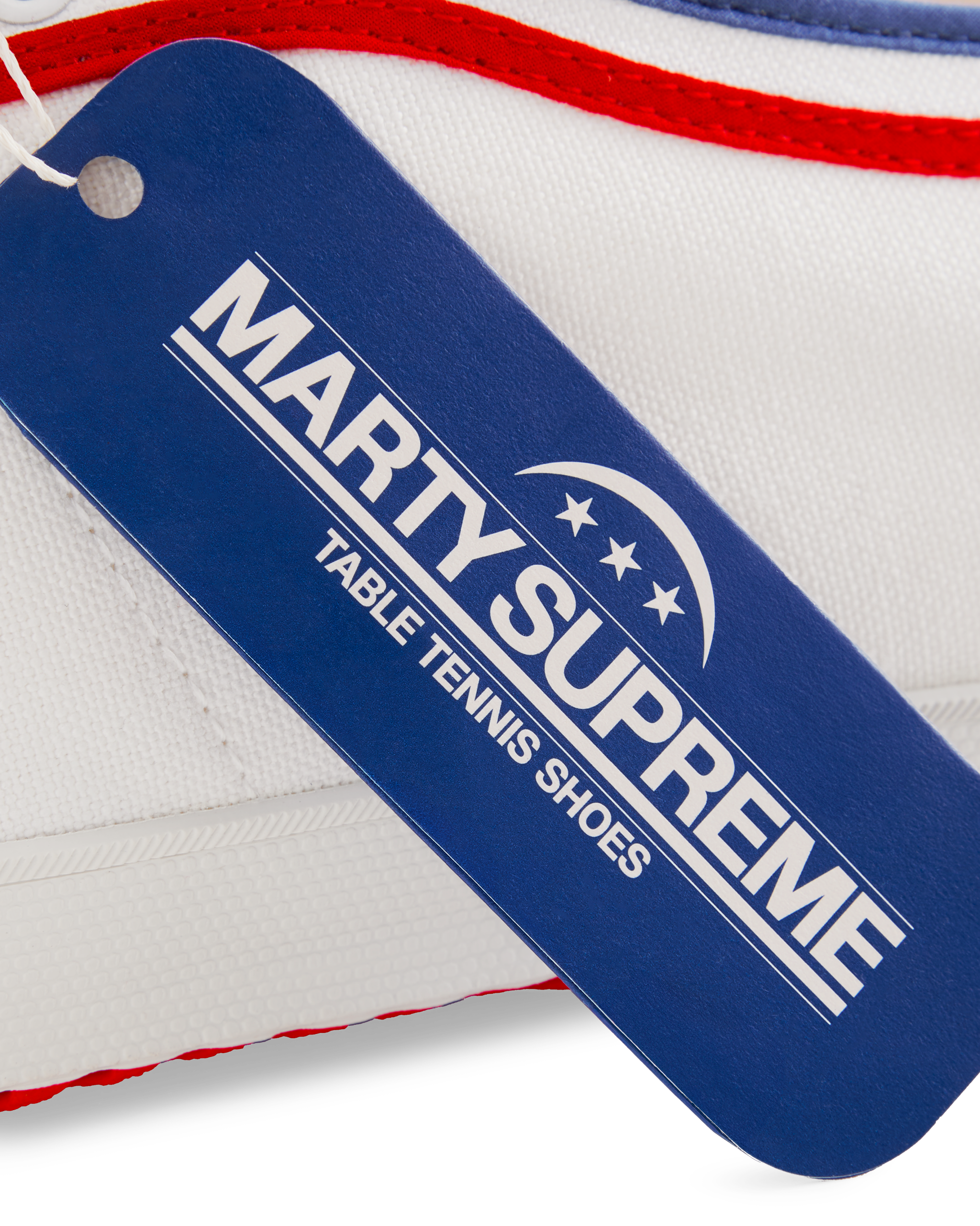 Blue collaboration hangtag from the Koyo Bear x Marty Supreme release, highlighting the limited-edition Made in Japan craftsmanship and heritage performance design.