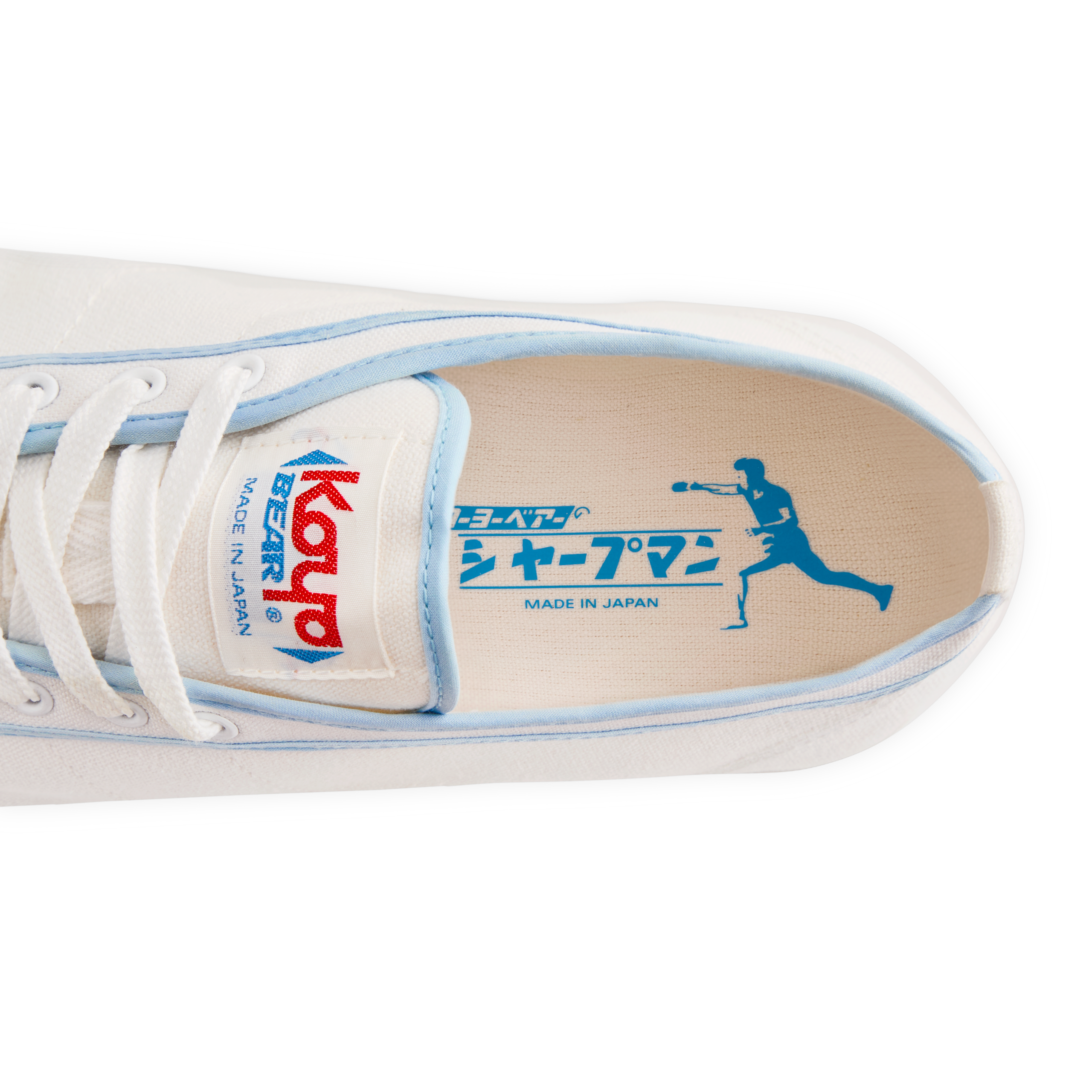 Top view of the insole inside the handmade Koyo Bear Sharpman Blue Trim canvas sneakers, made in Japan, showing the table tennis player graphic from the world’s first purpose-built table tennis shoe.