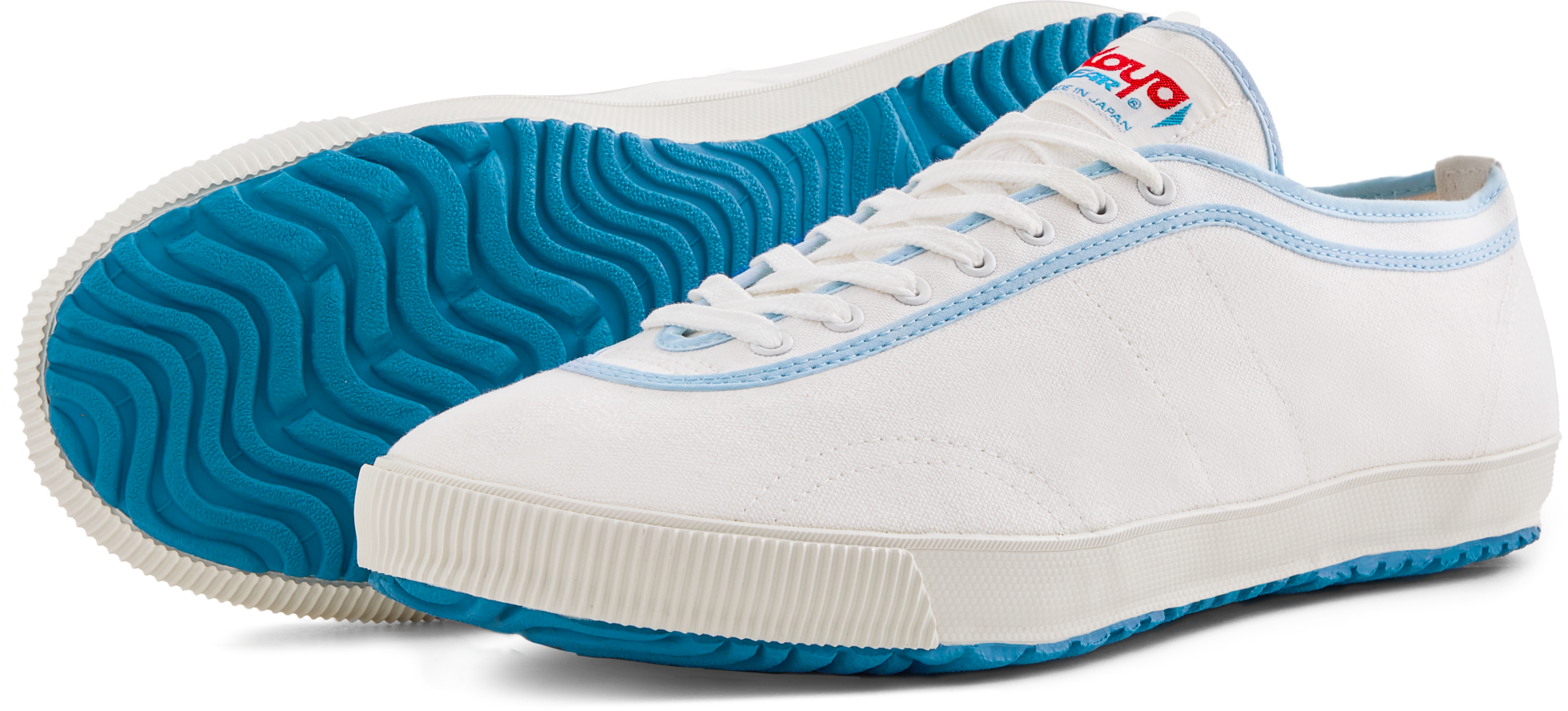 Side and sole view of the handmade Koyo Bear Sharpman White Trim canvas sneakers, made in Japan in white canvas with white piping and white vulcanised outsole, showing the classic low-profile design of the world’s first purpose-built table tennis shoe.