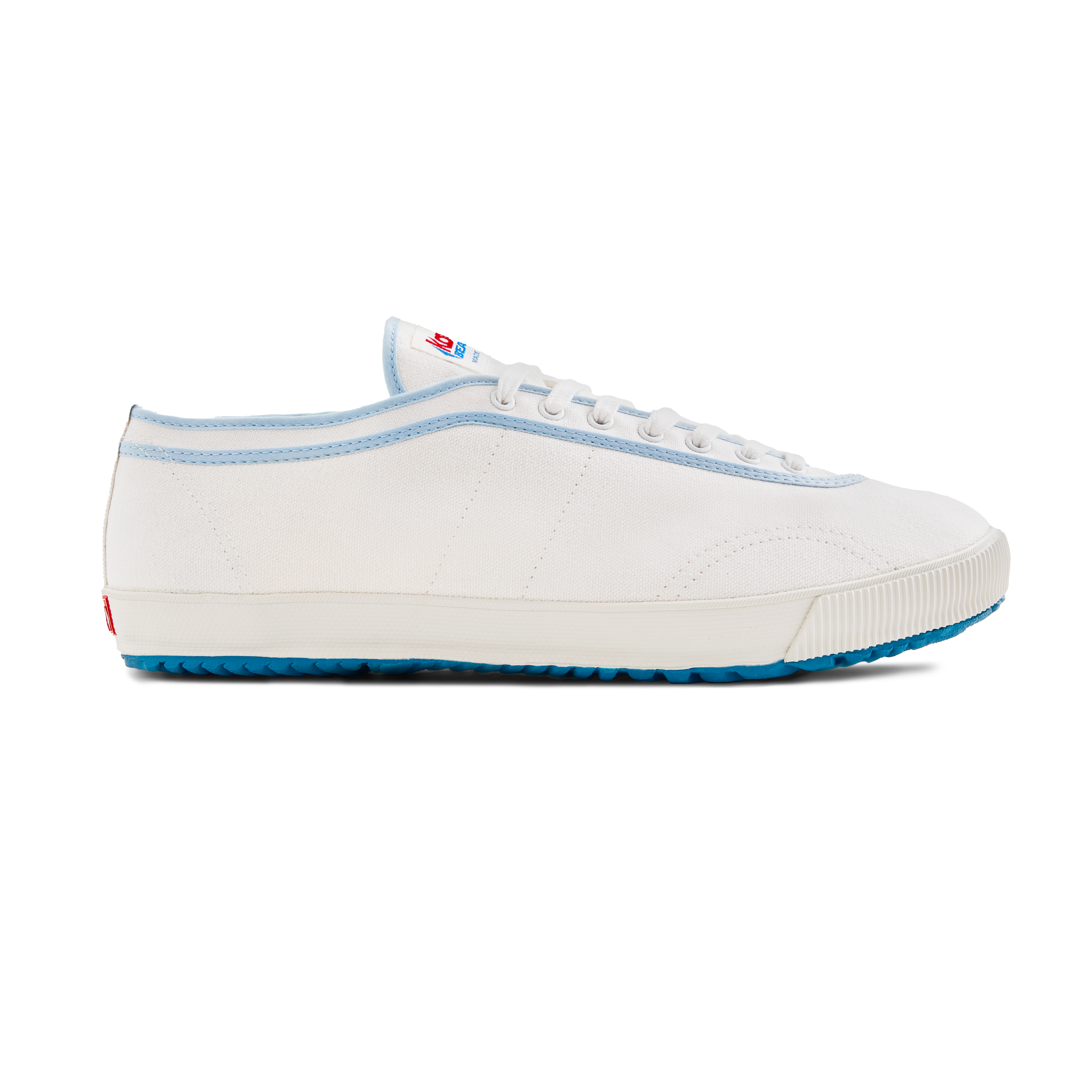 Side view of the handmade Koyo Bear Sharpman Blue Trim canvas sneakers, made in Japan in white canvas with light blue piping and blue vulcanised outsole, featuring the classic low-profile table tennis silhouette.