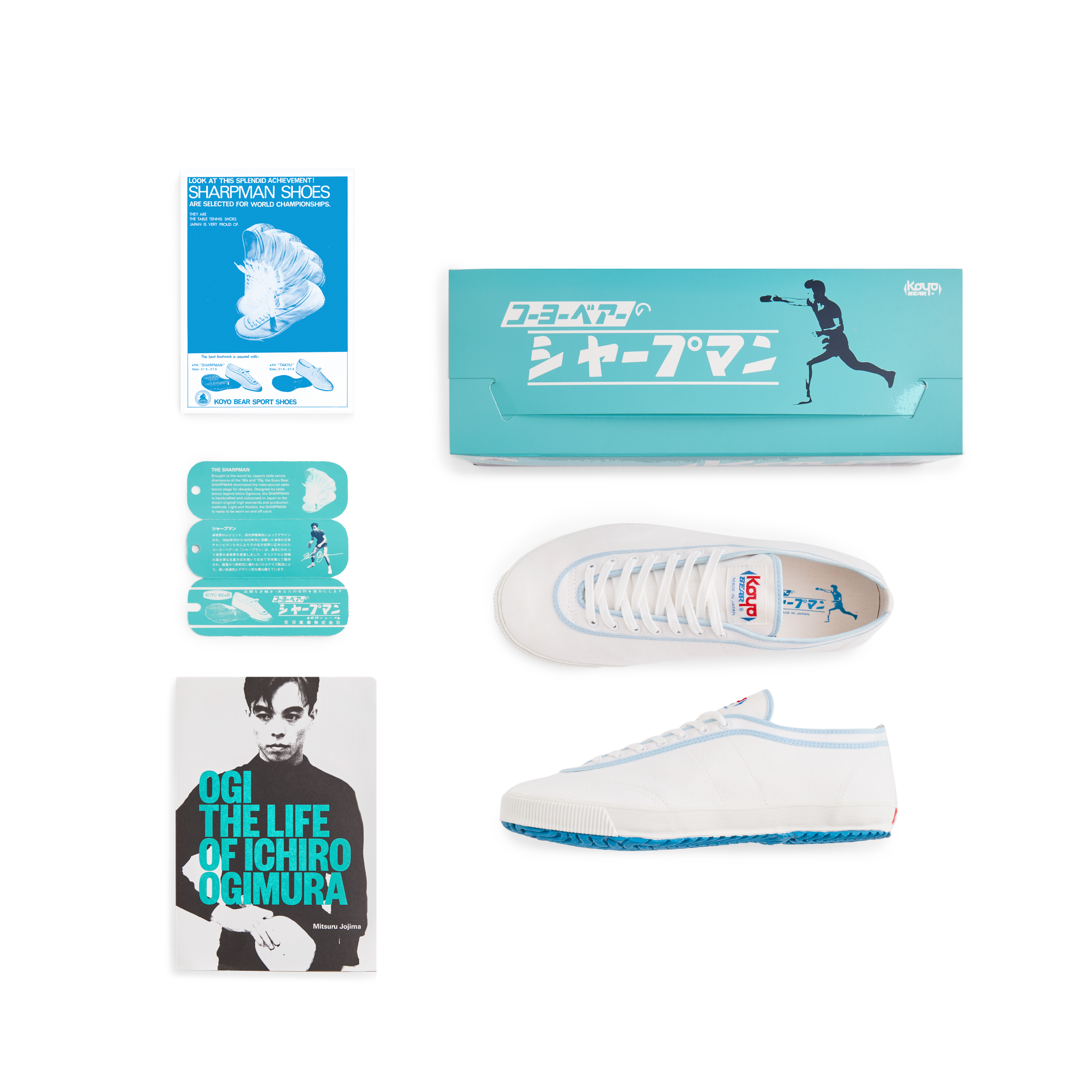 Set view of the handmade Koyo Bear Sharpman Blue Trim canvas sneakers, made in Japan, including the shoe box, hangtags, postcard, and the book “The Life of Ichiro Ogimura,” celebrating the world’s first purpose-built table tennis shoe.
