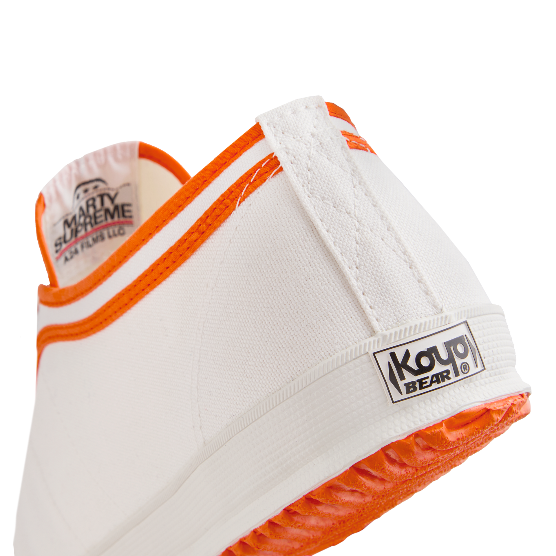 Side back view of the orange version Koyo Bear Sharpman Marty Supreme sneakers with red and blue trim, showing the heel patch and rear logo.