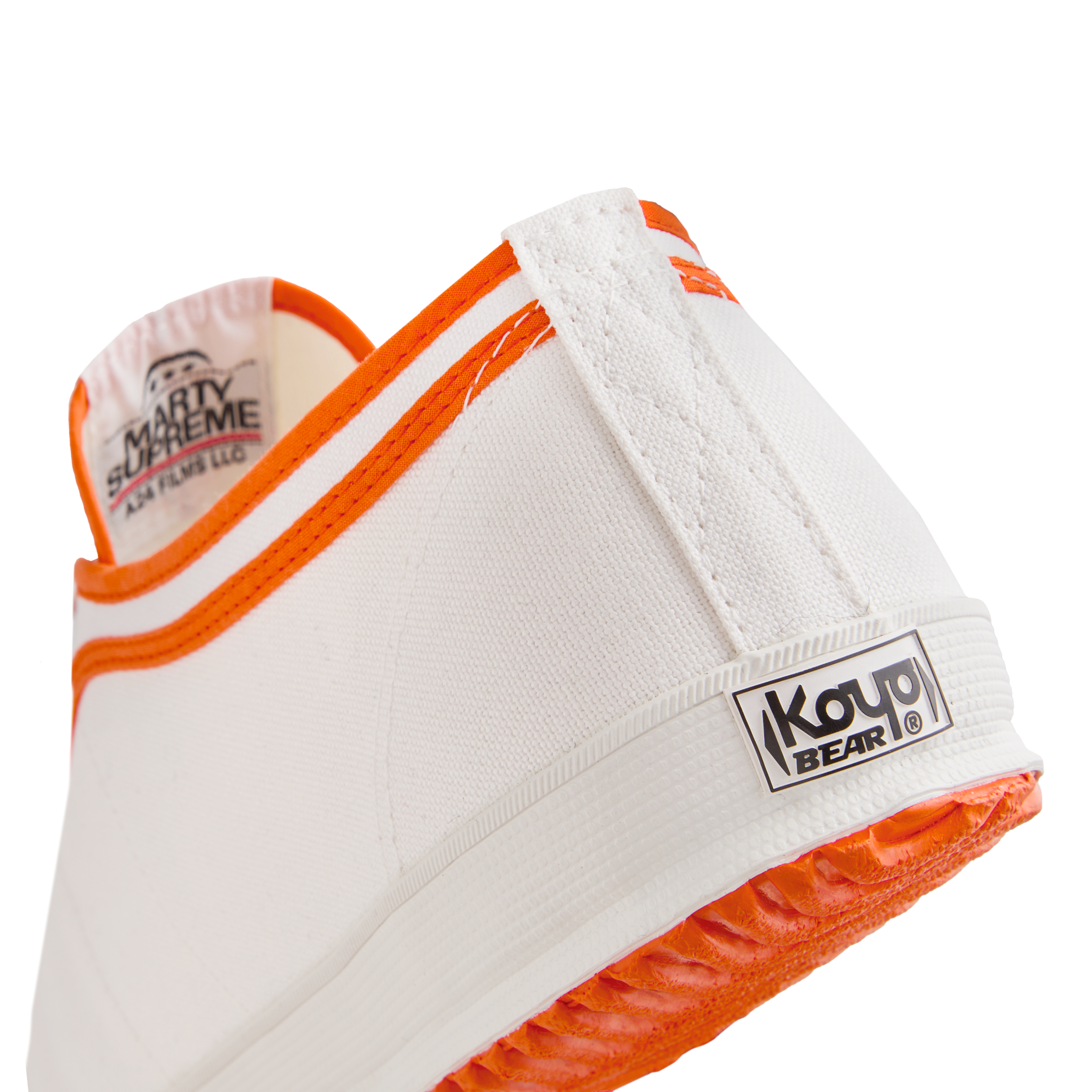 Side back view of the orange version Koyo Bear Sharpman Marty Supreme sneakers with red and blue trim, showing the heel patch and rear logo.
