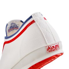 Side back view of the white Koyo Bear Sharpman Marty Supreme sneakers with red and blue trim, showing the heel patch and rear logo.