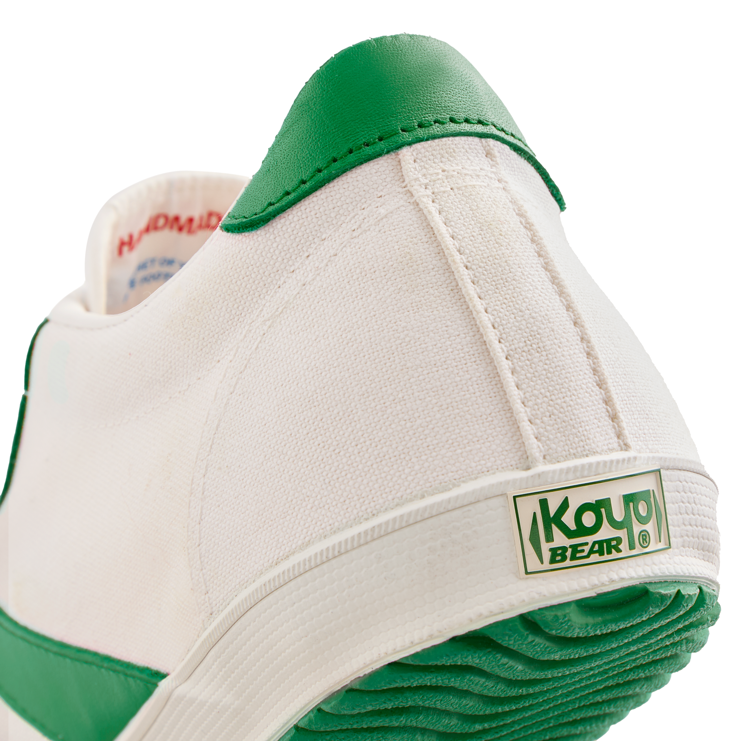 Back view of the Koyo Bear Sharpman Nimble Green sneakers showing the heel logo and green vulcanised outsole on the Made in Japan canvas upper.