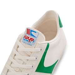 Close-up of the tongue label on the Koyo Bear Sharpman Nimble Green sneakers showing the Koyo Bear logo and Made in Japan branding.