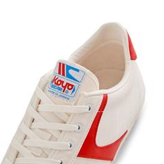 Close-up of the tongue label on the Koyo Bear Sharpman Nimble Red sneakers showing the Koyo Bear logo and Made in Japan branding.