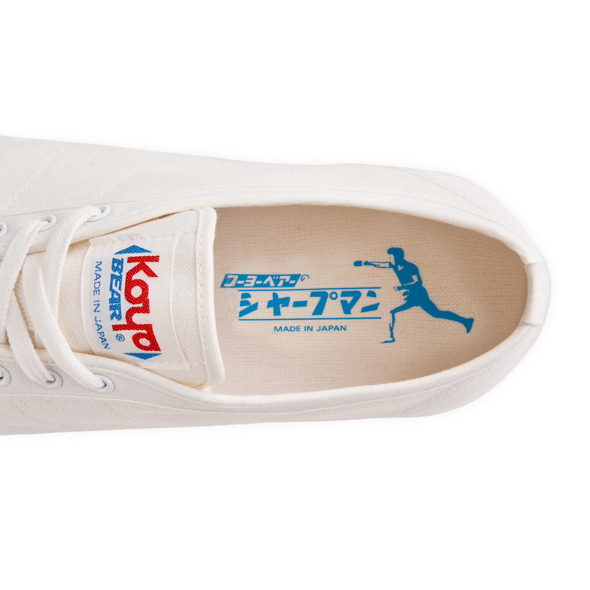 Top view of the insole inside the handmade Koyo Bear Sharpman White Trim canvas sneakers, made in Japan, showing the table tennis player graphic from the original purpose-built table tennis shoe.