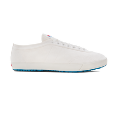 Side view of the handmade Koyo Bear Sharpman White Trim canvas sneakers, made in Japan in white canvas with subtle white piping, featuring the timeless silhouette of the original table tennis shoe.